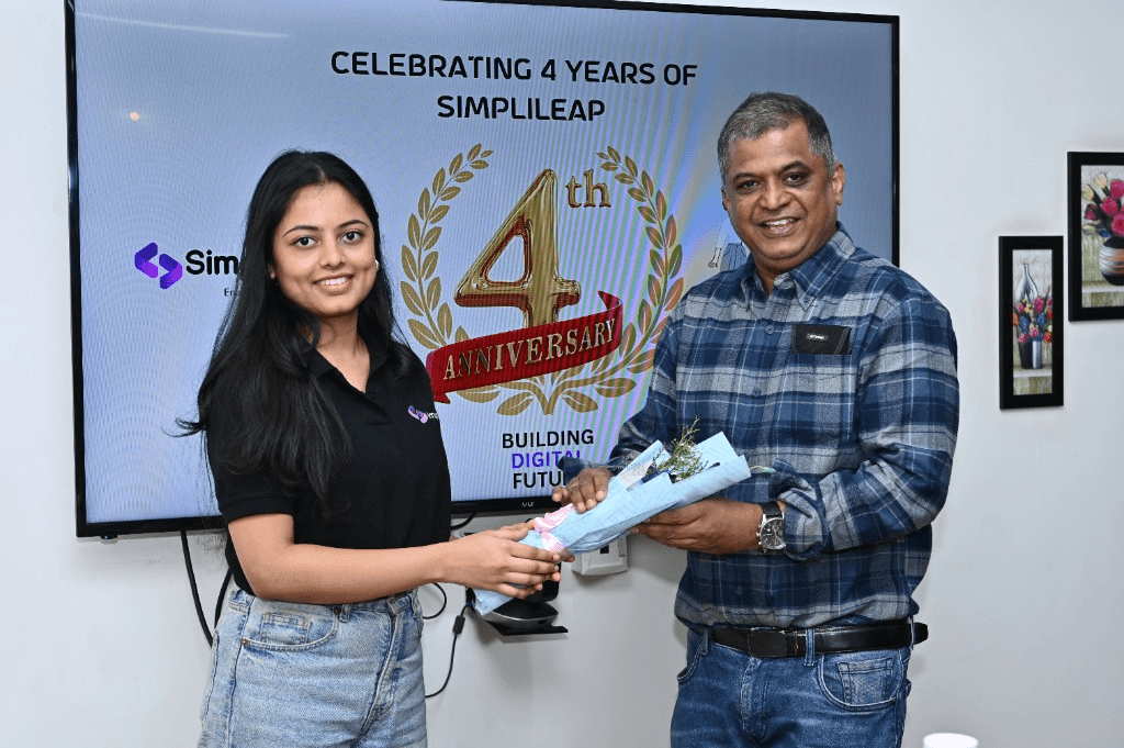 Team members celebrating Simplileap's 4th anniversary milestone