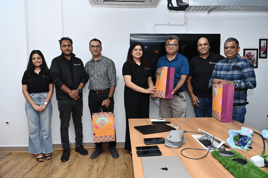 Simplileap team gathered in the office for a milestone celebration